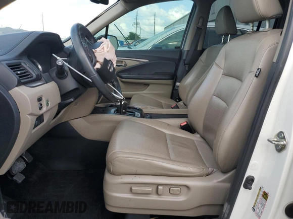 2017 Honda Ridgeline RTL-T with VIN 5FPYK2F69HB007182, listed as a Copart auction lot 52507175 with 74,956 mi miles and Salvage title. Bid and sale history available at DreamBid. Image 7.