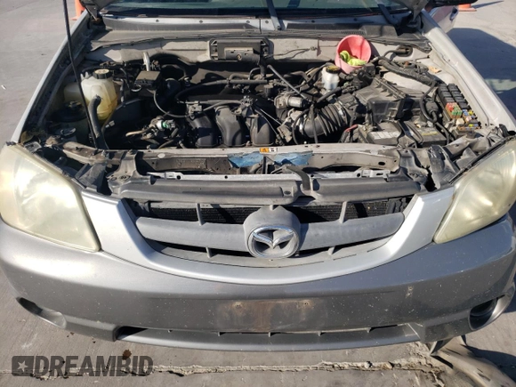 2002 Mazda Tribute LX with VIN 4F2YU09182KM64860, listed as a Copart auction lot 77391824 with 207,965 mi miles and Salvage Title. Bid and sale history available at DreamBid. Image 12.