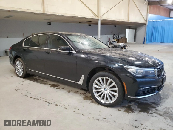 2017 BMW 7 Series 740i xDrive with VIN WBA7E4C53HGU99097, listed as a Copart auction lot 43945695 with 117,790 mi miles and Salvage Title. Bid and sale history available at carsss.com. Image 4.