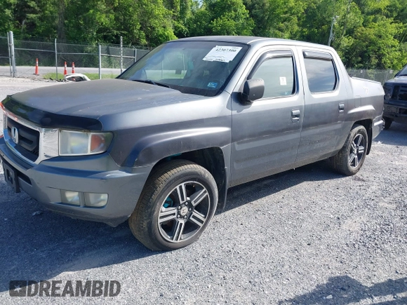 2009 Honda Ridgeline RTL with VIN 2HJYK16539H503533, listed as a IAAI auction lot 42307300 with 206,102 mi miles and . Bid and sale history available at DreamBid. Image 2.