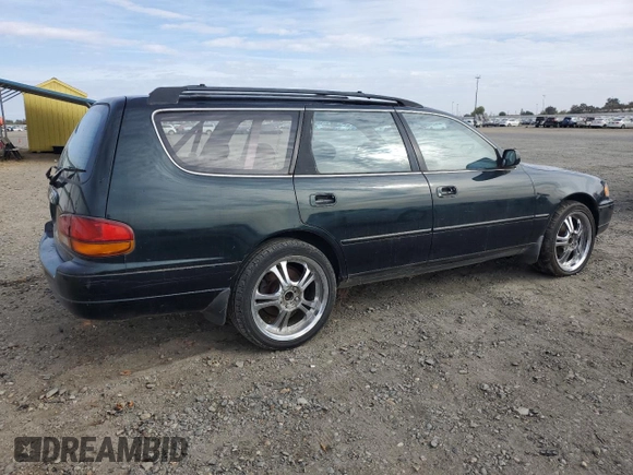 1995 Toyota Camry LE z VIN 4T1GK12W4SU079938, wystawiony jako Copart lot #77065084 z przebiegiem 222 731 mil mil oraz Szkoda całkowita • Salvage title. Historia ofert i sprzedaży dostępna na DreamBid. Obrazek 3.