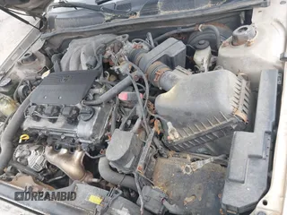 2000 Toyota Camry LE z VIN 4T1BF22K5YU938013, wystawiony jako IAAI lot #42477316 z przebiegiem 239 736 mil mil oraz . Historia ofert i sprzedaży dostępna na DreamBid. Obrazek 10.
