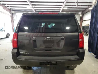 2015 Chevrolet Tahoe LT with VIN 1GNSCBKC3FR112306, listed as a Copart auction lot 51282355 with 136,492 mi miles and Salvage Title. Bid and sale history available at DreamBid. Image 6.
