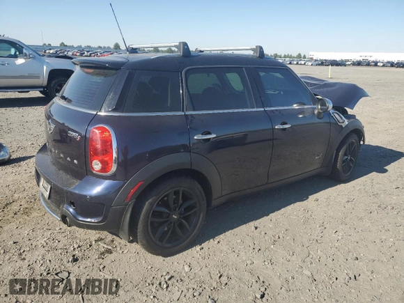 2013 MINI Countryman S ALL4 with VIN WMWZC5C52DWM16196, listed as a Copart auction lot 65157165 with Not provided miles and Salvage title. Bid and sale history available at DreamBid. Image 3.