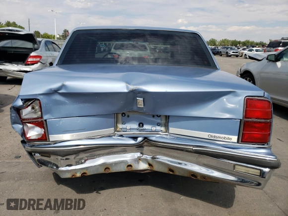 1989 Oldsmobile Delta z VIN 1G3HN54C8KH301125, wystawiony jako Copart lot #70709764 z przebiegiem 87 068 mil mil oraz Tytuł czysty. Historia ofert i sprzedaży dostępna na DreamBid. Obrazek 6.