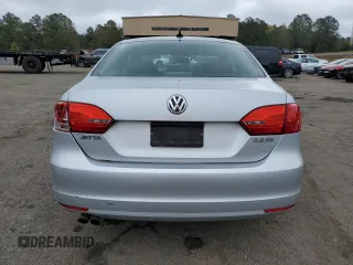 2013 Volkswagen Jetta SE with VIN 3VWDX7AJ0DM404624, listed as a Copart auction lot 50316255 with 153,763 mi miles and Salvage title. Bid and sale history available at DreamBid. Image 6.