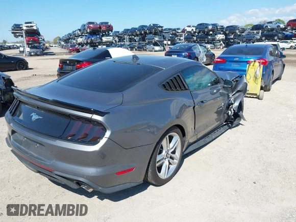 2021 Ford Mustang EcoBoost with VIN 1FA6P8TH5M5108957, listed as a IAAI auction lot 41678800 with 31,219 mi miles. Bid and sale history available at carsss.com. Image 4.