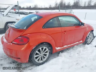2017 Volkswagen Beetle 1.8T SE with VIN 3VWJ17AT3HM624934, listed as a IAAI auction lot 41389551 with 29,109 mi miles. Bid and sale history available at carsss.com. Image 4.