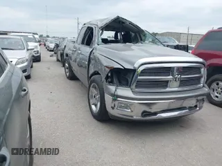 2012 Ram 1500 Big Horn z VIN 1C6RD6GTXCS268181, wystawiony jako IAAI lot #42033913 z przebiegiem 269 553 mil mil oraz . Historia ofert i sprzedaży dostępna na DreamBid. Obrazek 1.