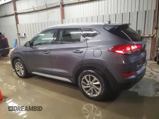 2018 Hyundai Tucson SEL with VIN KM8J3CA46JU734310, listed as a Copart auction lot 57978435 with 128,379 mi miles and Clean title. Bid and sale history available at DreamBid. Image 2.