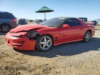 2001 Pontiac Firebird Formula z VIN 2G2FV22G112117625, wystawiony jako Copart lot #81836394 z przebiegiem 142 503 mil mil oraz Szkody całkowita. Historia ofert i sprzedaży dostępna na DreamBid. Obrazek 1.