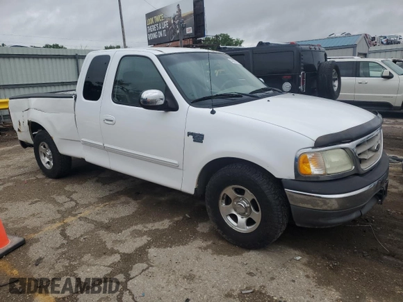 2002 Ford F-150 XL with VIN 1FTRX17L52KC49698, listed as a Copart auction lot 54307145 with 254,394 mi miles and Salvage title. Bid and sale history available at DreamBid. Image 4.
