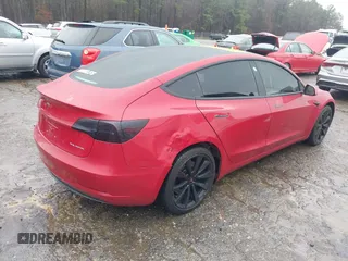 2018 Tesla Model 3 Long Range Battery z VIN 5YJ3E1EB7JF135199, wystawiony jako IAAI lot #41580853 z przebiegiem 131 774 mil mil oraz . Historia ofert i sprzedaży dostępna na DreamBid. Obrazek 4.