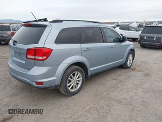 2013 Dodge Journey SXT with VIN 3C4PDDBG2DT724768, listed as a IAAI auction lot 40926457 with 150,862 mi miles and . Bid and sale history available at DreamBid. Image 4.