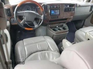 2003 Chevrolet Express Cargo YF7 Upfitter with VIN 1GBFG15T031162552, listed as a Copart auction lot 79677874 with 187,193 mi miles and Salvage title. Bid and sale history available at DreamBid. Image 8.
