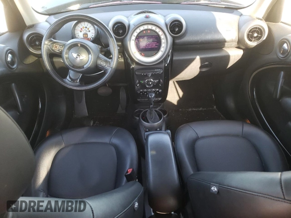 2012 MINI Countryman with VIN WMWZB3C58CWM03815, listed as a Copart auction lot 50097405 with 84,137 mi miles and Salvage Title. Bid and sale history available at DreamBid. Image 8.