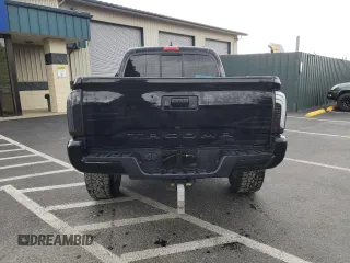 2022 Toyota Tacoma SR z VIN 3TYRZ5CN1NT016153, wystawiony jako Copart lot #56624785 z przebiegiem 88 633 mil mil oraz Czysty tytuł • Clean title. Historia ofert i sprzedaży dostępna na DreamBid. Obrazek 6.