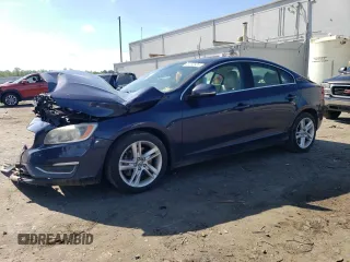 2014 Volvo S60 T5 with VIN YV1612FS7E2271834, listed as a Copart auction lot 61202325 with 180,185 mi miles and Salvage title. Bid and sale history available at DreamBid. Image 1.