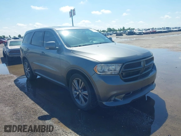 2013 Dodge Durango R/T z VIN 1C4SDHCT7DC564802, wystawiony jako IAAI lot #42348957 z przebiegiem 178 354 mil mil oraz . Historia ofert i sprzedaży dostępna na DreamBid. Obrazek 1.
