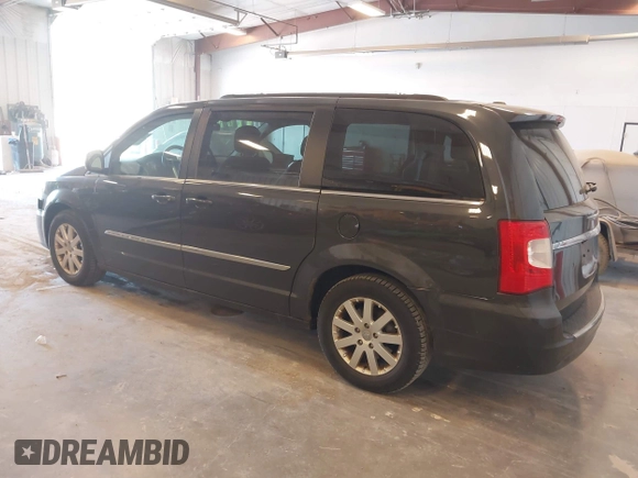 2012 Chrysler Town & Country Touring with VIN 2C4RC1BG6CR208571, listed as a IAAI auction lot 42098322 with 159,903 mi miles and . Bid and sale history available at DreamBid. Image 3.