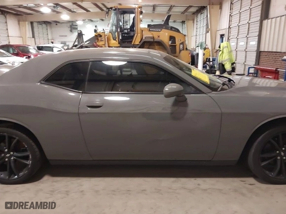 2018 Dodge Challenger SXT with VIN 2C3CDZAG0JH217129, listed as a IAAI auction lot 41088114 with 103,317 mi miles. Bid and sale history available at carsss.com. Image 14.