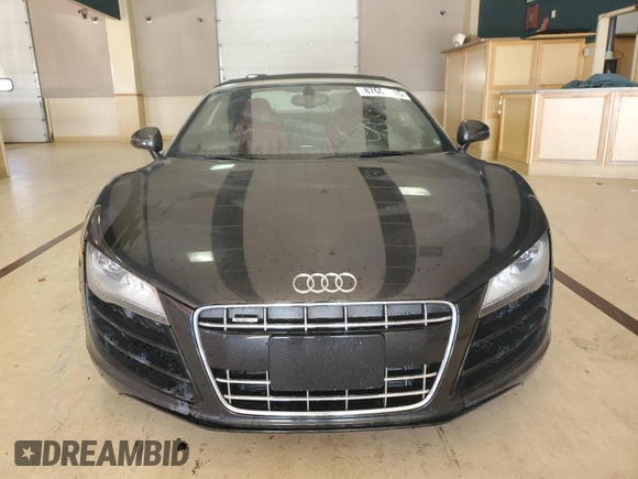 2011 Audi R8 z VIN WUATNAFG7BN002863, wystawiony jako Copart lot #87601245 z przebiegiem Nie podano mil oraz Tytuł czysty. Historia ofert i sprzedaży dostępna na DreamBid. Obrazek 5.