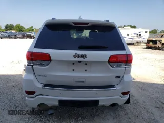2018 Jeep Grand Cherokee Overland z VIN 1C4RJFCG4JC425589, wystawiony jako Copart lot #61775775 z przebiegiem 102 040 mil mil oraz Szkoda całkowita • Salvage title. Historia ofert i sprzedaży dostępna na DreamBid. Obrazek 6.