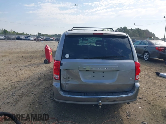 2016 Dodge Grand Caravan SXT with VIN 2C4RDGCG7GR325113, listed as a IAAI auction lot 42045811 with 86,372 mi miles and . Bid and sale history available at DreamBid. Image 17.
