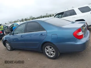 2004 Toyota Camry LE with VIN 4T1BF32K54U572537, listed as a IAAI auction lot 41850322 with 167,076 mi miles and . Bid and sale history available at DreamBid. Image 14.