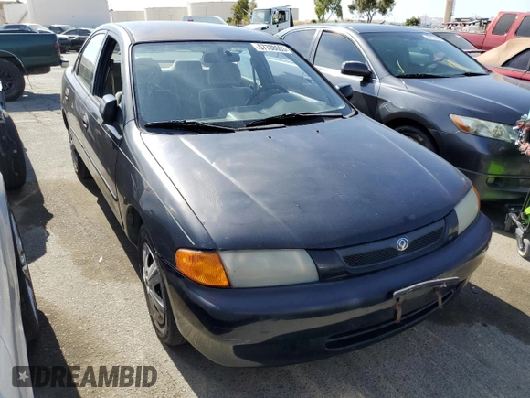 1997 Mazda Protege DX z VIN JM1BC1412V0157268, wystawiony jako Copart lot #61380564 z przebiegiem 85 356 mil mil oraz Szkoda całkowita • Salvage title. Historia ofert i sprzedaży dostępna na DreamBid. Obrazek 4.