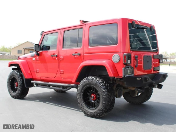 2015 Jeep Wrangler Unlimited Rubicon with VIN 1C4BJWFG7FL646463, listed as a Copart auction lot 53700245 with 97,412 mi miles and Salvage Title. Bid and sale history available at carsss.com. Image 4.