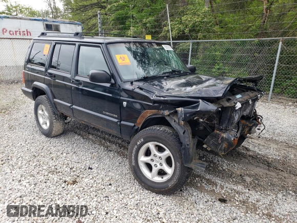 2001 Jeep Cherokee Sport с VIN 1J4FF48S31L615450, выставлен на аукционе Copart как лот 55835585 с пробегом 246 694 миль миль и Списание • Salvage title. История ставок и продаж доступна на DreamBid. Изображение 4.