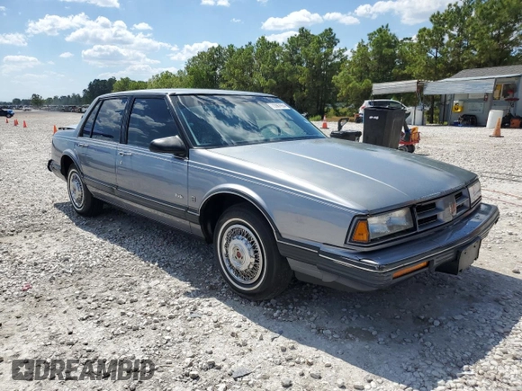 1991 Oldsmobile 88 z VIN 1G3HY54C4MH336805, wystawiony jako Copart lot #73367654 z przebiegiem 168 436 mil mil oraz Szkoda całkowita • Salvage title. Historia ofert i sprzedaży dostępna na DreamBid. Obrazek 4.