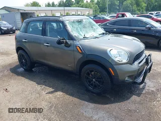 2012 MINI Countryman S z VIN WMWZC5C58CWL56505, wystawiony jako IAAI lot #42485230 z przebiegiem 88 887 mil mil oraz . Historia ofert i sprzedaży dostępna na DreamBid. Obrazek 1.