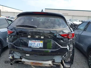 2020 Mazda CX-5 Grand Touring with VIN JM3KFADM3L1819939, listed as a IAAI auction lot 42749920 with 35,407 mi miles and . Bid and sale history available at DreamBid. Image 17.