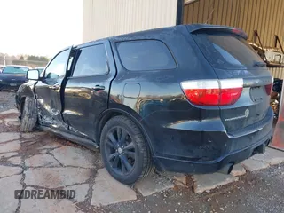 2013 Dodge Durango R/T z VIN 1C4SDHCT5DC558951, wystawiony jako IAAI lot #41590515 z przebiegiem 150 985 mil mil oraz . Historia ofert i sprzedaży dostępna na DreamBid. Obrazek 3.