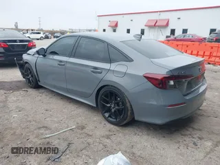 2025 Honda Civic Sport z VIN 2HGFE2F56SH505972, wystawiony jako IAAI lot #41634259 z przebiegiem 11 043 mil mil oraz . Historia ofert i sprzedaży dostępna na DreamBid. Obrazek 3.