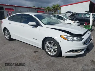 2018 Ford Fusion SE z VIN 3FA6P0LU8JR157528, wystawiony jako IAAI lot #42146177 z przebiegiem 133 452 mil mil oraz . Historia ofert i sprzedaży dostępna na DreamBid. Obrazek 1.