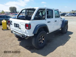 2018 Jeep Wrangler Unlimited Sport S z VIN 1C4HJXDG6JW210973, wystawiony jako IAAI lot #42154094 z przebiegiem 116 620 mil mil oraz . Historia ofert i sprzedaży dostępna na DreamBid. Obrazek 4.