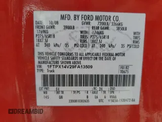 2009 Ford F-150 XL with VIN 1FTPX14V29FA13509, listed as a Copart auction lot 57792265 with 229,312 mi miles and Salvage title. Bid and sale history available at DreamBid. Image 12.