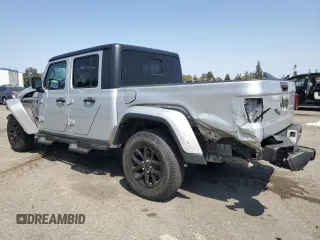 2022 Jeep Gladiator Altitude с VIN 1C6HJTAG1NL164724, выставлен на аукционе Copart как лот 62400065 с пробегом 46 993 миль миль и Списание • Salvage title. История ставок и продаж доступна на DreamBid. Изображение 2.