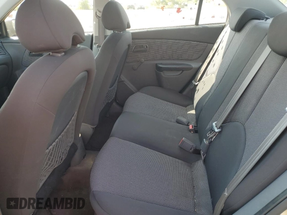 2011 Kia Rio with VIN KNADH4B38B6725531, listed as a Copart auction lot 72389974 with 124,315 mi miles and Salvage Title. Bid and sale history available at DreamBid. Image 10.