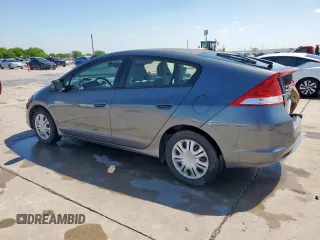 2010 Honda Insight LX with VIN JHMZE2H56AS042097, listed as a Copart auction lot 53972215 with 107,182 mi miles and Salvage Title. Bid and sale history available at DreamBid. Image 2.