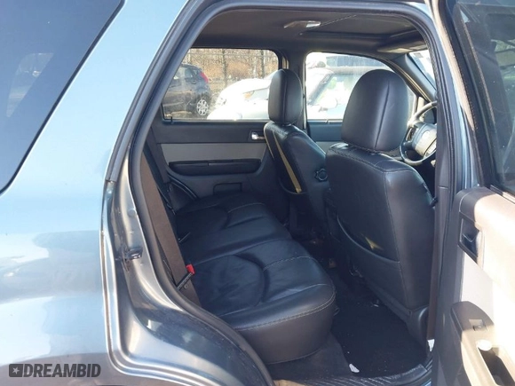 2010 Mercury Mariner with VIN 4M2CN9BG0AKJ02637, listed as a IAAI auction lot 41579241 with 128,095 mi miles. Bid and sale history available at carsss.com. Image 8.