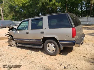 1999 Chevrolet Tahoe Z71 with VIN 1GNEK13R1XJ315188, listed as a Copart auction lot 68498944 with 264,880 mi miles and Salvage Title. Bid and sale history available at carsss.com. Image 2.