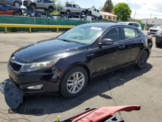 2013 Kia Optima LX z VIN 5XXGM4A76DG132559, wystawiony jako Copart lot #57969465 z przebiegiem 144 253 mil mil oraz Szkoda całkowita • Salvage title. Historia ofert i sprzedaży dostępna na DreamBid. Obrazek 1.
