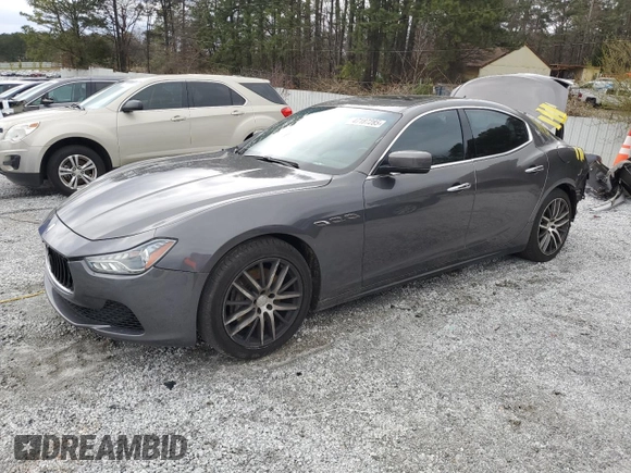 2014 Maserati Ghibli z VIN ZAM57XSA9E1096594, wystawiony jako Copart lot #47187285 z przebiegiem 114 050 mil mil oraz Szkody całkowita. Historia ofert i sprzedaży dostępna na DreamBid. Obrazek 1.