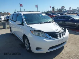 2014 Toyota Sienna LE AAS with VIN 5TDKK3DC4ES515791, listed as a IAAI auction lot 42304201 with 113,139 mi miles and . Bid and sale history available at DreamBid. Image 1.