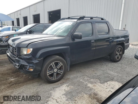 2014 Honda Ridgeline Sport with VIN 5FPYK1F75EB001197, listed as a Copart auction lot 65932295 with 121,862 mi miles and Salvage title. Bid and sale history available at DreamBid. Image 1.