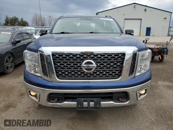2017 Nissan Titan SV with VIN 1N6AA1EJXHN534790, listed as a Copart auction lot 52567735 with 184,884 mi miles and Salvage Title. Bid and sale history available at DreamBid. Image 5.